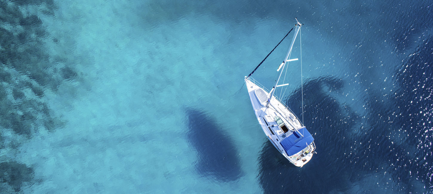Sailboat in blue water